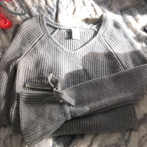 Sweater with cute ties around the wrist